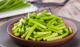 海螺炒蒜苔的做法（海螺炒蒜苔的做法视频）